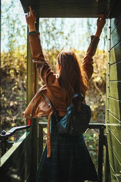 Young Woman Backpack Rising Hands Standing Retro Train — 스톡 사진