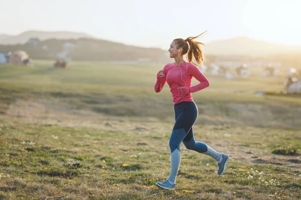 Young Female Runner Headset Jogging Morning Mountains — 스톡 사진