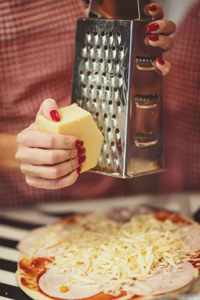 Close Young Female Hands Grating Cheese Putting Pizza — Stock Photo, Image