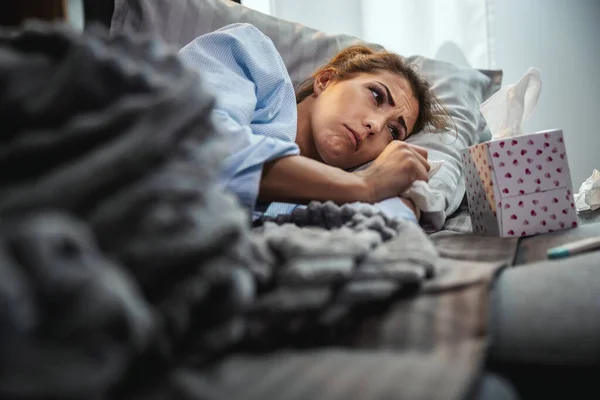 Young Woman Lying Sick Home Couch Paper Handkerchief Blowing Nose — Stock Photo, Image