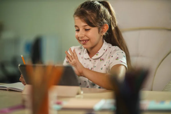 Shot Cute Little Girl Using Her Tablet Online Lesson Waving — Stock Photo, Image