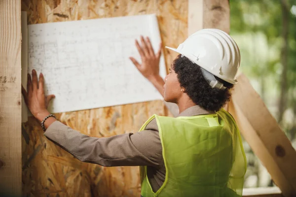 Shot African Female Architect Checking Construction Site New Wooden House — Stock Photo, Image