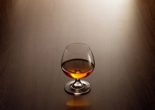 View Glass Cognac Brown Color Wooden Table Surface — Stock Photo, Image