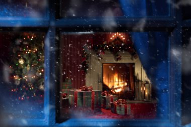 view of wrapped gifts and fireplace with christmas tree on the back clipart