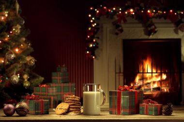 Bir bardak sütün, kurabiyelerin arka plandaki rengini kapat