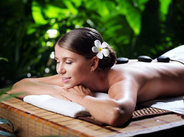 portrait of young beautiful woman in spa environment.