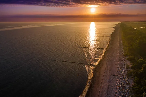 Zonsondergang aan zee Stockfoto