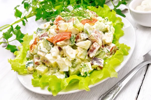 Salad Salmon Cucumber Eggs Avocado Dressed Mayonnaise Lettuce Leaves Plate — Stock Photo, Image