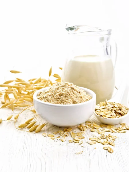 Flour Oat Bowl Milk Jug Oatmeal Spoon Oaten Stalks Background — Stock Photo, Image