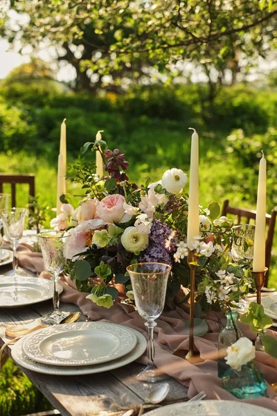 Wedding dinner in the garden. table setting