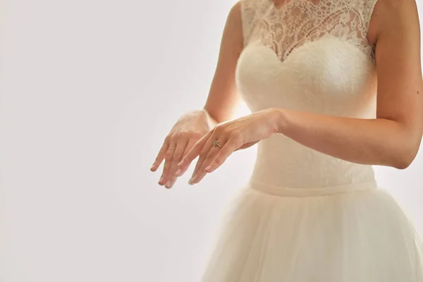 stock image The morning of the bride, when she wears a beautiful dress, a woman prepares before the wedding ceremony an exciting moment