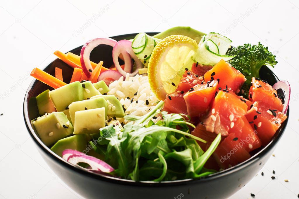 poke bowl with salmon islated on white background. side view
