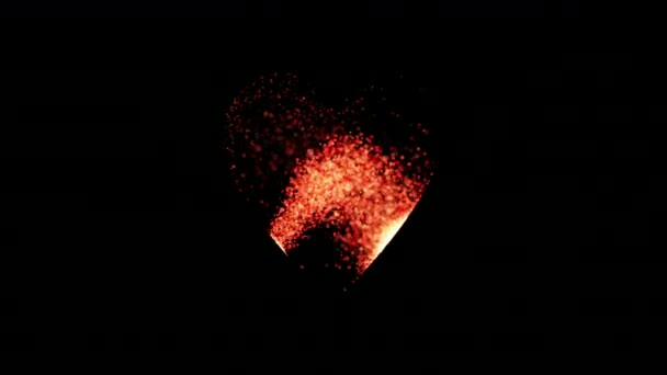 Particles randomly fill the heart shape — Stock Video