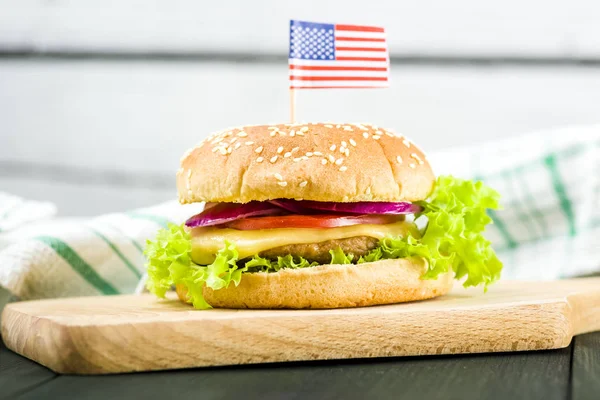 American cheeseburger quick and tasty breakfast on white background