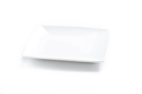 Uyumak arka plan üzerinde beyaz tabak — Stok fotoğraf
