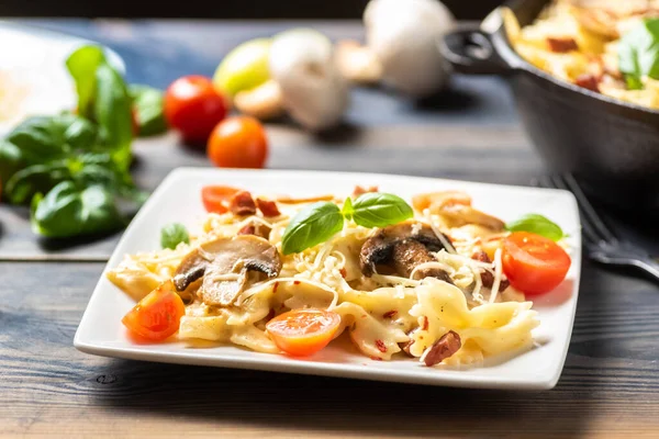 stock image casserole  pasta with mushrooms, sausage and cheese