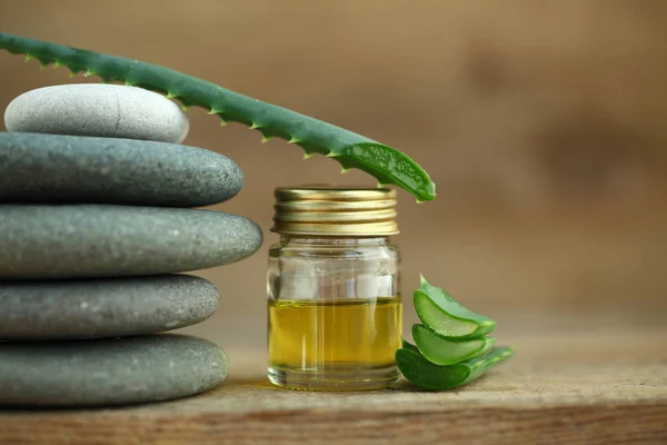 aloe oil spa therapy wood background