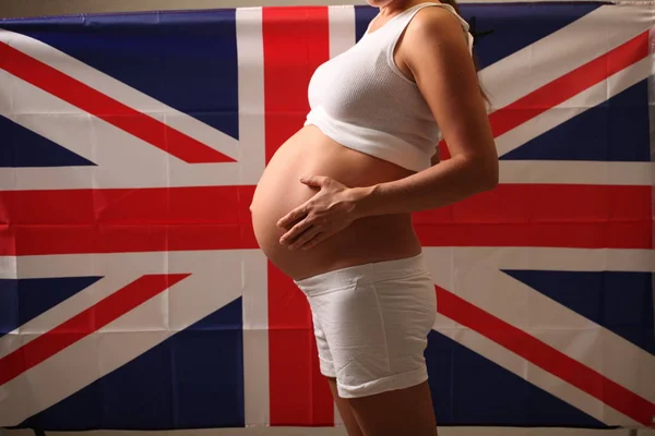 Fertilidad Reino Unido Concepto Una Niña Embarazada Bandera Inglesa — Foto de Stock