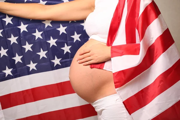 Fertility America Concept Pregnant Girl American Flag Stock Image