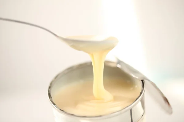 Sweetened Condensed Milk Spoon — Stock Photo, Image