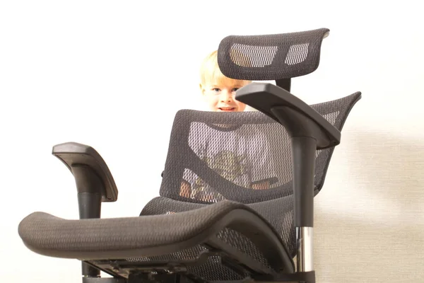 black office ergonomic chair with mesh coating.