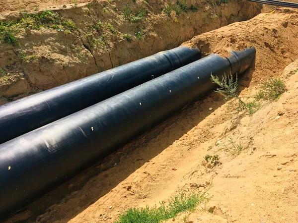 Nieuwe Geïsoleerde Waterleidingen Bouwplaats Van Loopgraven — Stockfoto