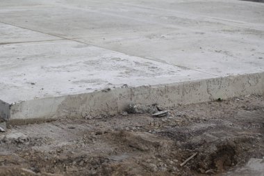 çimento yol inşaatı genişletildi. Yıkanmış beton teknoloji