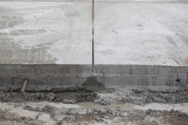 çimento yol inşaatı genişletildi. Yıkanmış beton teknoloji