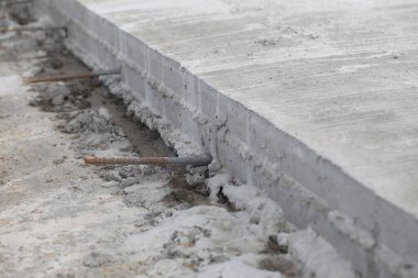 çimento yol inşaatı genişletildi. Yıkanmış beton teknoloji