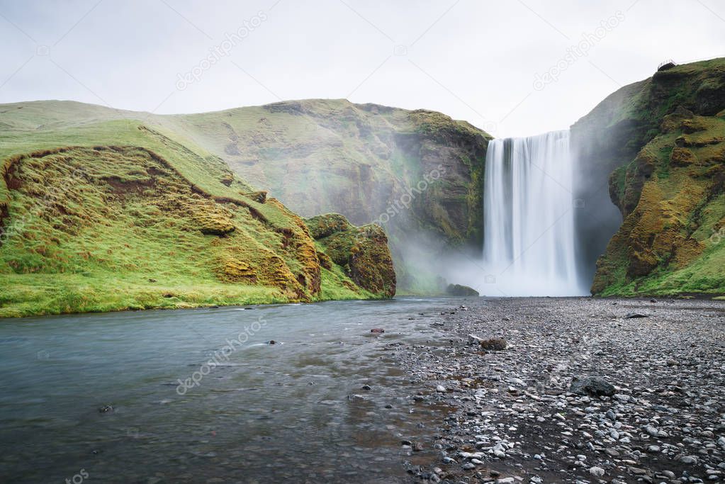 Skogafoss - waterfall on the Skoga river in the south of Iceland at the cliffs. Amazing in nature