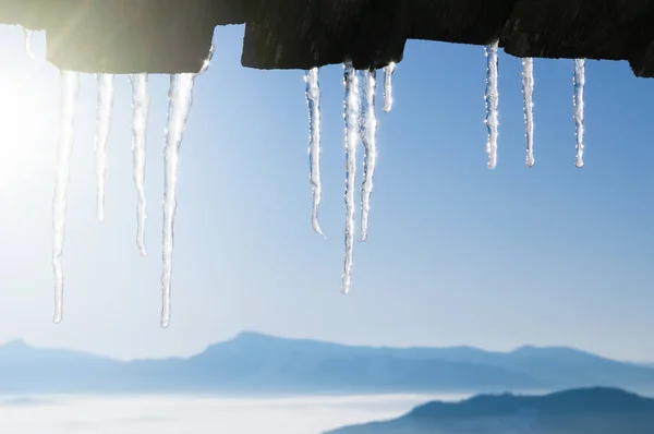 Winter Background Icicles Border Sunny Weather Blue Sky Mountain Peaks — Stock Photo, Image