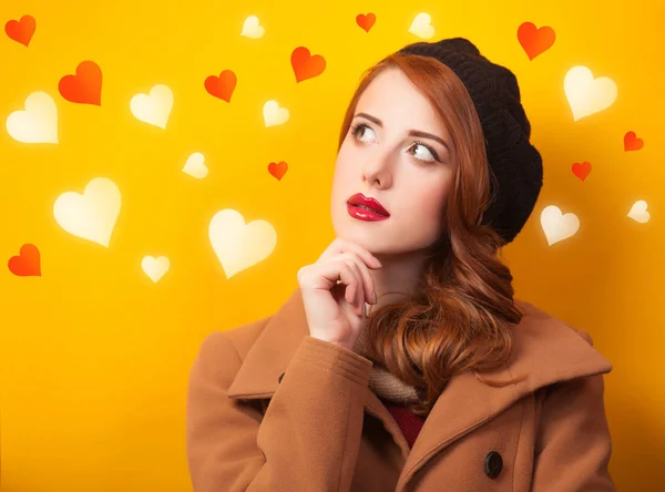 Redhead women in beret with hearts — Stock Photo, Image