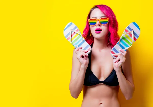 Young pink hair girl in bikini and rainbow glasses — Stock Photo, Image