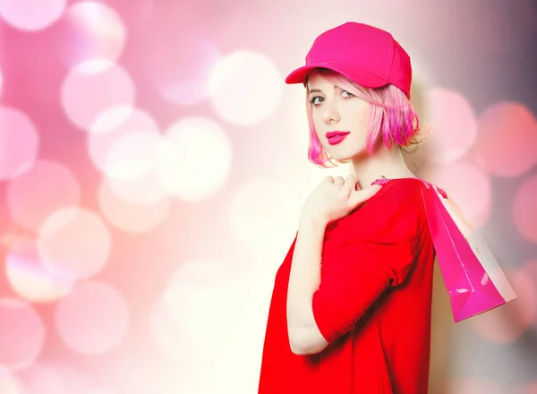 Young woman with shopping bag — Stock Photo, Image