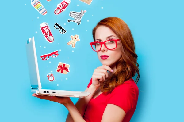 Girl in eyeglasses with laptop computer — Stock Photo, Image