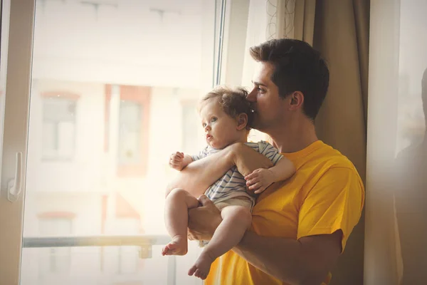 Father playing with a little baby at home. — Stock Photo, Image