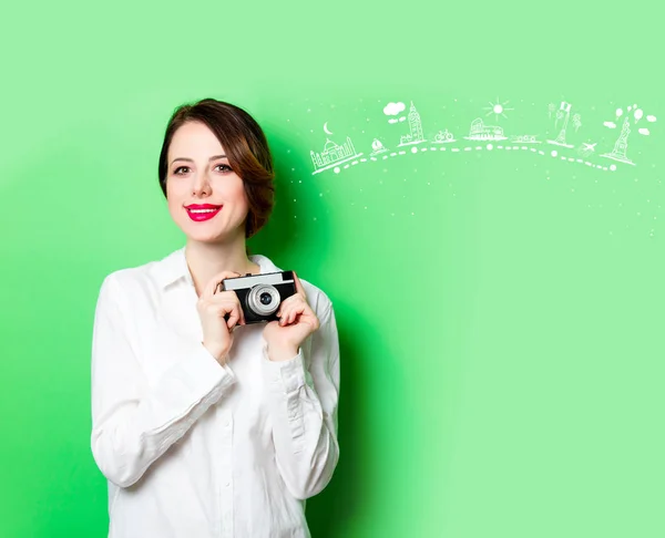 Young woman with camera and route — Stock Photo, Image