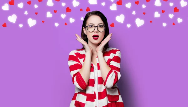 Surprised woman with hearts — Stock Photo, Image