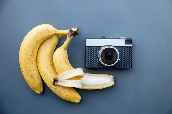 Vintage camera with banana — Stock Photo, Image