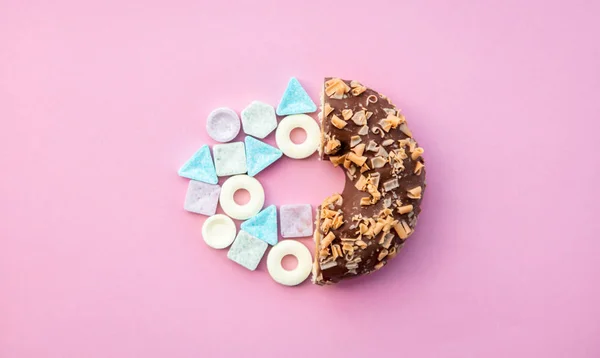 Hard candy and chocolade donut — Stock Photo, Image