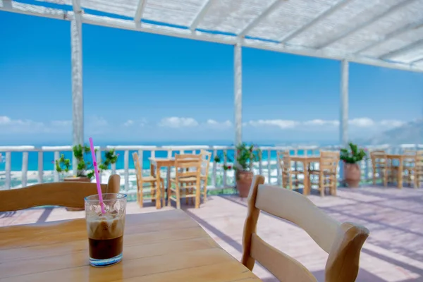 Glass with coffee on a table, Greece — Stock Photo, Image