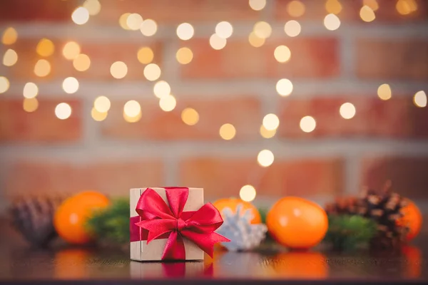 Christmas Gift Box Cones Oranges Background Fairy Lights Bokeh Holiday — Stock Photo, Image