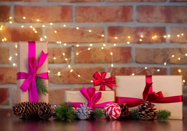 Gift Boxes Background Fairy Lights Bokeh Christmas Holiday Season — Stock Photo, Image