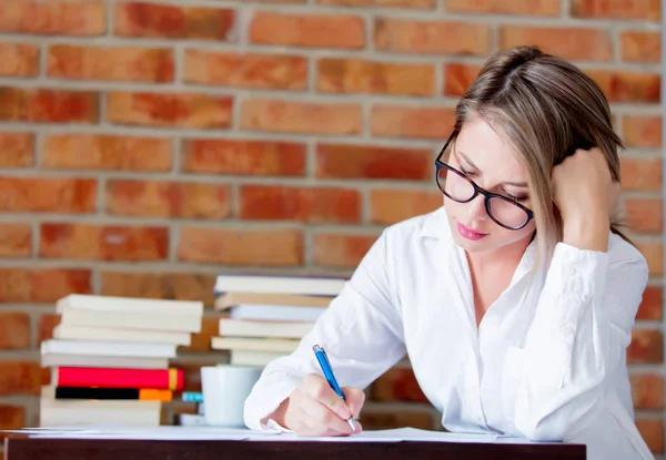 Businesswoman with migraine on working place — Stock Photo, Image