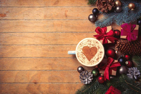 Cappuccino with heart shape and Christmas decoration — Stock Photo, Image