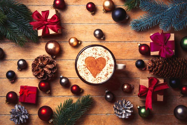 cappuccino with heart shape and Christmas decoration