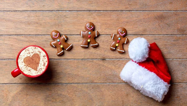 Gingerbread Cookies Santa Claus Hat Coffee Wooden Table — Stock Photo, Image