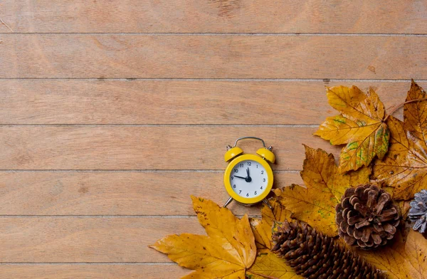 Little Vintage Yellow Alarm Clock Maple Leaves Wooden Table — Stock Photo, Image
