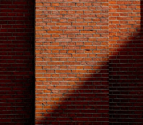 Vista al muro di mattoni con ombra — Foto Stock
