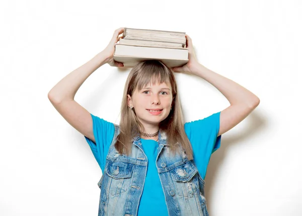 Jovem adolescente com livros — Fotografia de Stock